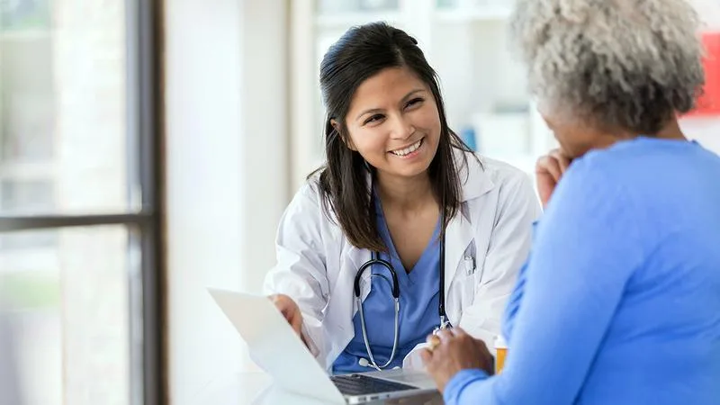 Cardiology team reviewing patient data