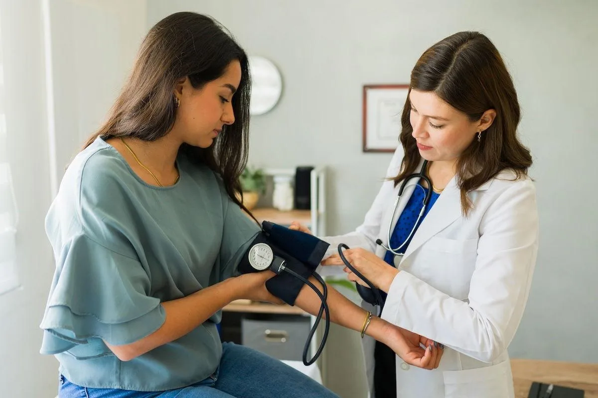 Clinician discussing cardiovascular monitoring with a patient