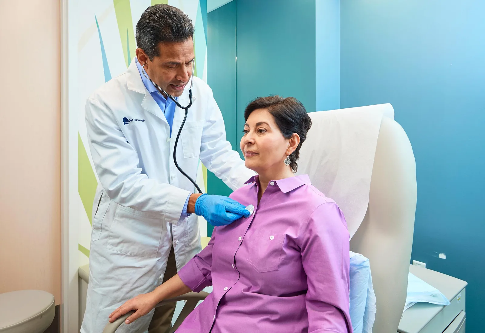 Healthcare professional discussing respiratory care with a patient